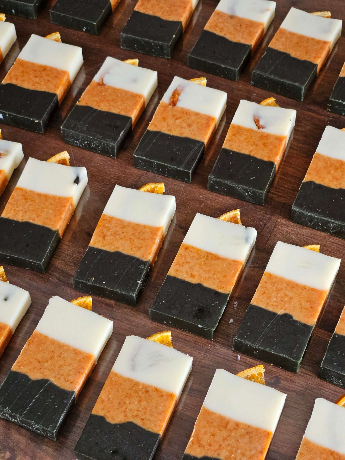 thin spice soaps laying on worktop ready to be stamped